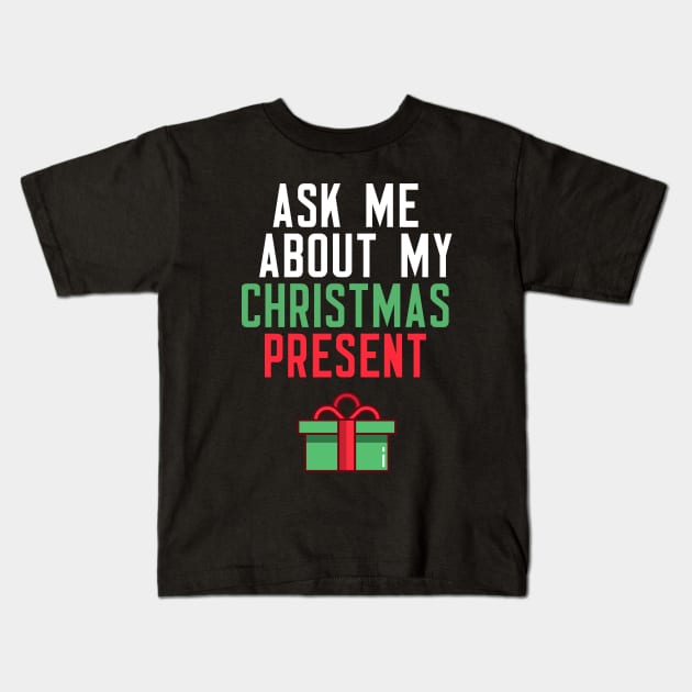 Ask Me About My Christmas Present Kids T-Shirt by cleverth